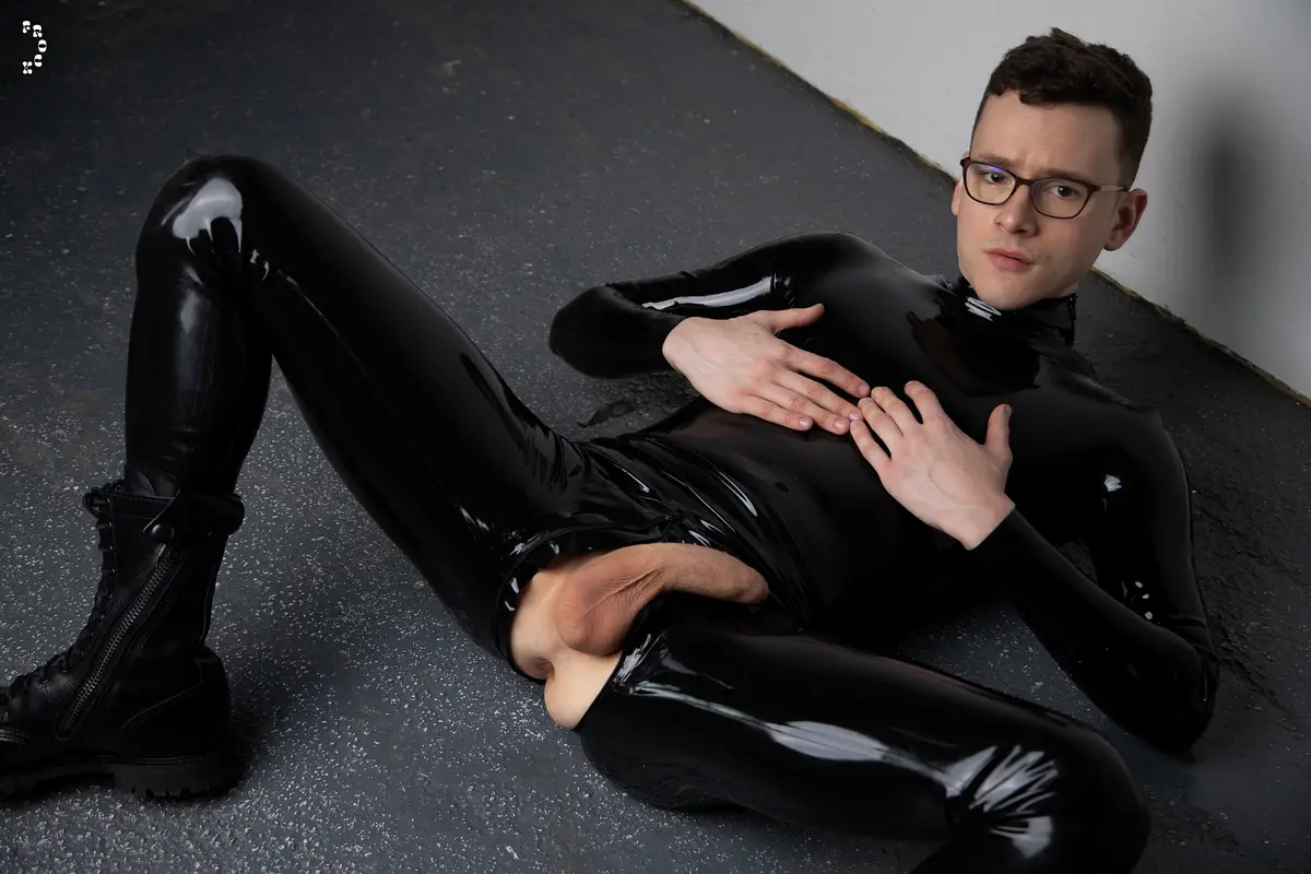 Rubber Boy David Licks His Own Boots